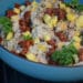 Erfrischender Mango Couscous Salat mit Kichererbsen und getrockneten Tomaten